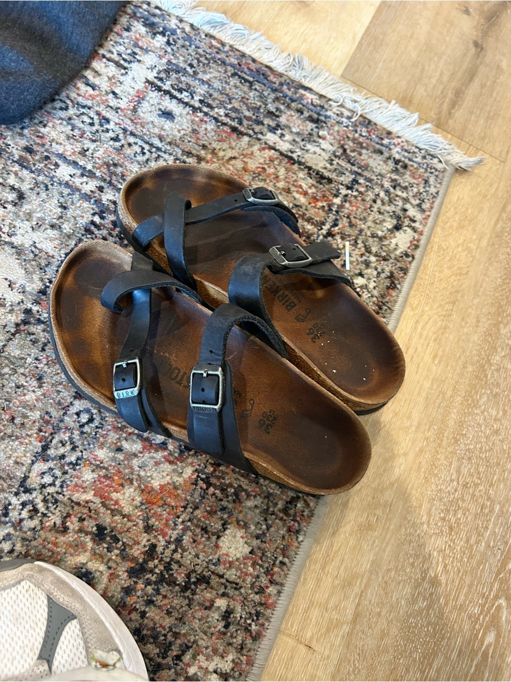 Birkenstock Black Leather Slide Sandals with Brown Footbed